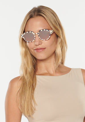 KREWE - ASTOR | Gingham Mirrored Handcrafted, luxury blue and white checkered sunglasses womens model | Model: Erica
