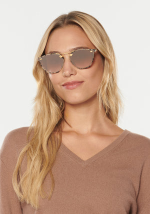 KREWE - BEAU NYLON | Matte Oyster 18K Mirrored handcrafted, luxury tortoise shell sunglasses with a double metal bridge womens model campaign | Model: Erica