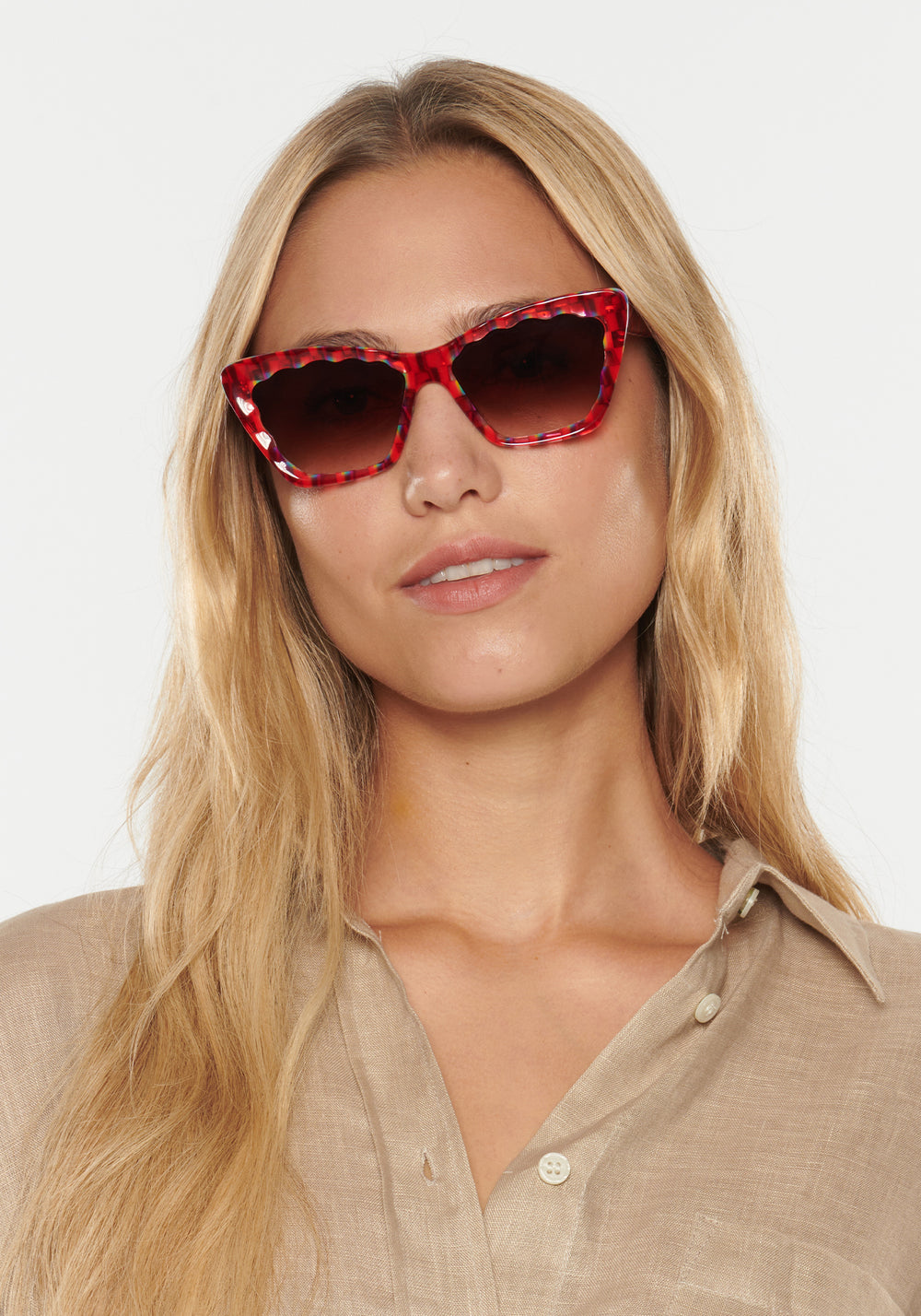 BRIGITTE | Cherry over Fierte Handcrafted, luxury red and rainbow checkered scalloped cat-eye KREWE sunglasses womens model | Model: Erica
