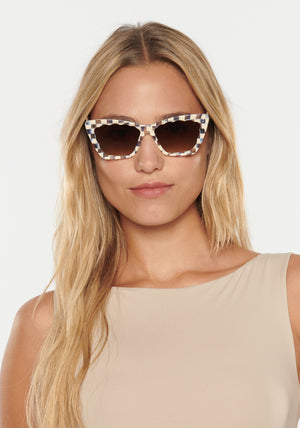 BRIGITTE | Gingham Handcrafted, Blue and White Checkered Acetate KREWE Sunglasses womens model | Model: Erica