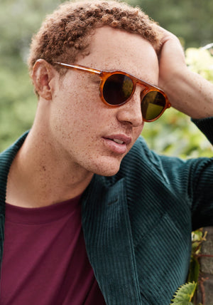 KREWE SUNGLASSES - CAMERON | Amaro handcrafted, luxury orange acetate round sunglasses mens model campaign | Model: Dustin