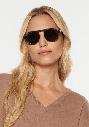 CAMERON | Tortuga Polarized Handcrafted, luxury dark brown acetate round aviator KREWE sunglasses womens model | Model: Erica