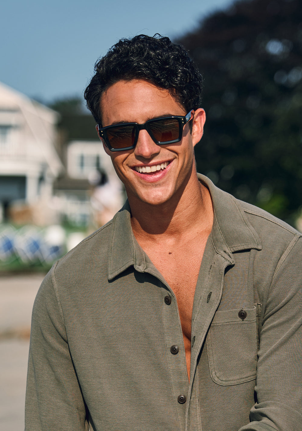 CARTER | Black + Black Tea Polarized Handcrafted, black acetate rectangular square polarized KREWE sunglasses mens model campaign | Model: Conrado