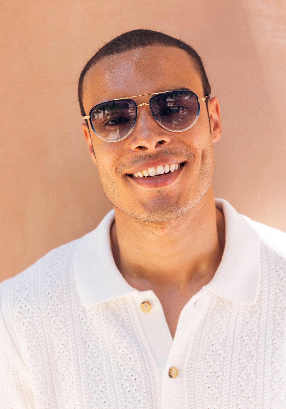 KREWE SUNGLASSES - COLEMAN | 18K + Matte Indigo Fade + Gravity + Custom Vanity Tint handcrafted, luxury aviators with blue gradient tinted lenses mens model campaign | Model: Jeffrey