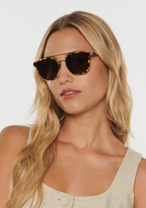 COLISEUM NYLON | Canary 18K Handcrafted, multicolored tortoise acetate oversized square aviator nylon edge to edge lens KREWE sunglasses womens model | Model: Erica