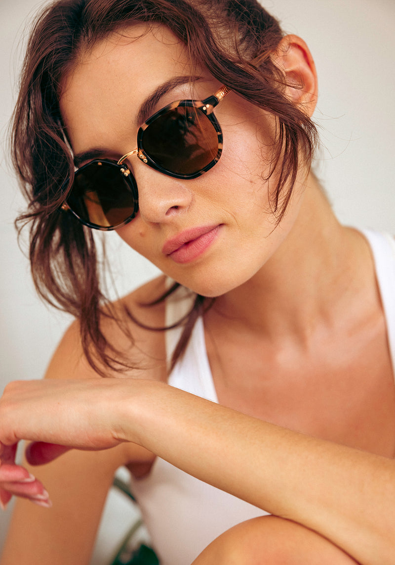 KREWE DAKOTA | Iberia + Haze Polarized 18K Handcrafted, luxury, designer tortoise shell acetate sunglasses womens model campaign | Model: Kennidy