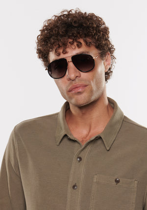 FELIX | 18K Black + Black Tea Handcrafted, luxury oversized teardrop stainless steel and black acetate aviator KREWE Greyson sunglasses mens model | Model: Miguel