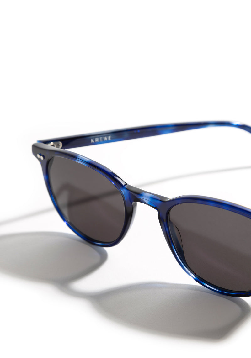 LANDRY | Indigo Tort Handcrafted, luxury dark blue indigo acetate round KREWE sunglasses womens model