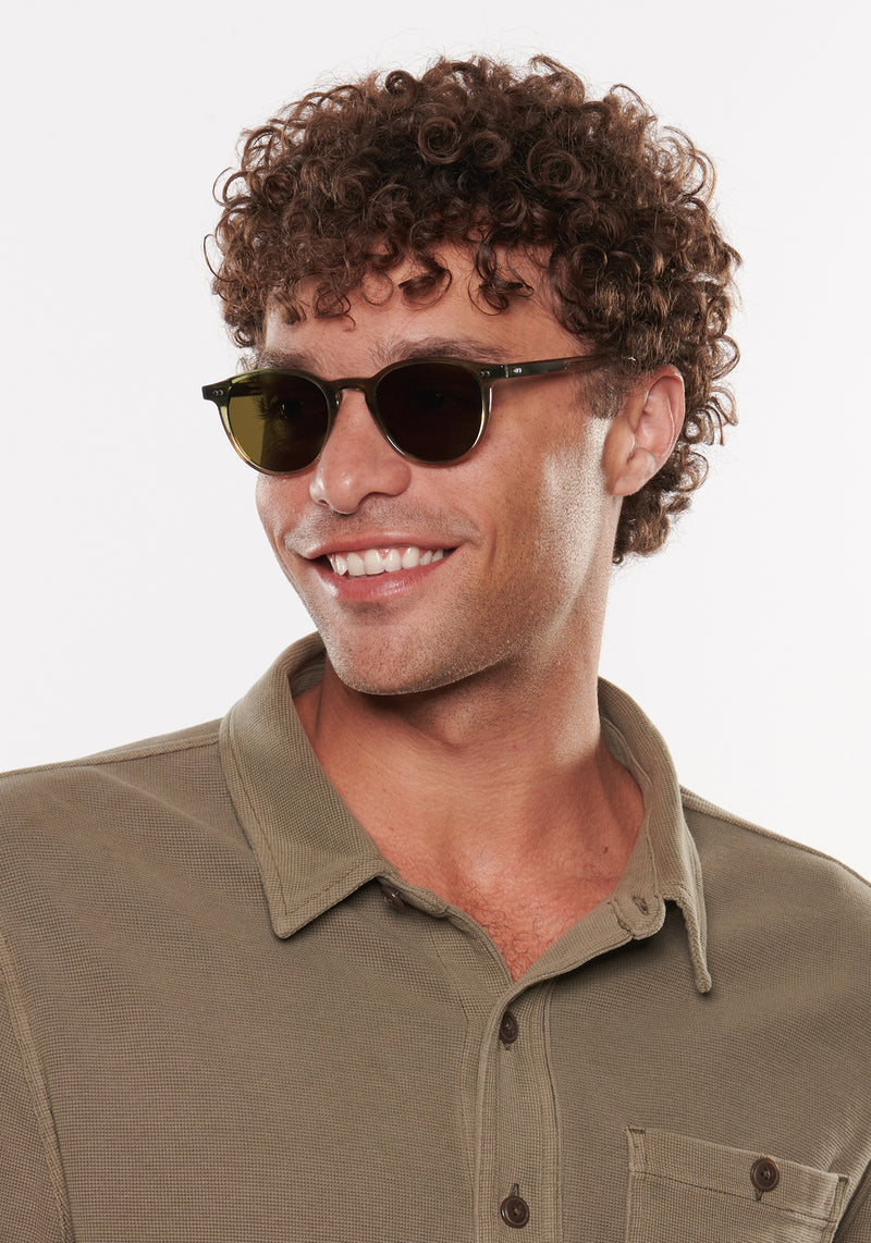 KREWE SUNGLASSES - LANDRY | Verde handcrafted, luxury green acetate round sunglasses mens model | Model: Miguel