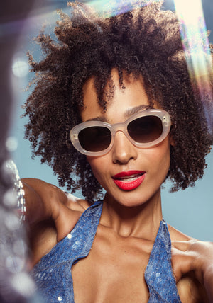 MARGARET | Platinum Blonde Handcrafted, luxury cream white acetate medium sized oval bubble frame KREWE sunglasses womens model campaign | Model: Melie