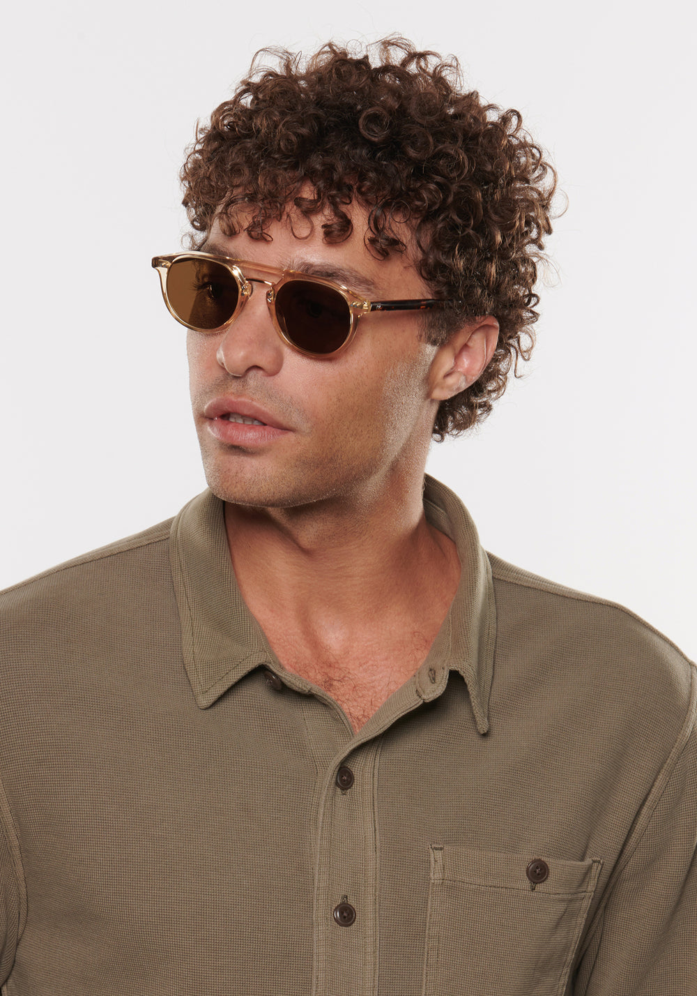 MARKLE | Champagne + Rue Tortoise 18K Polarized Handcrafted, luxury translucent tan acetate medium round KREWE Greyson polarized sunglasses with gold stainless steel metal hardware mens model | Model: Miguel