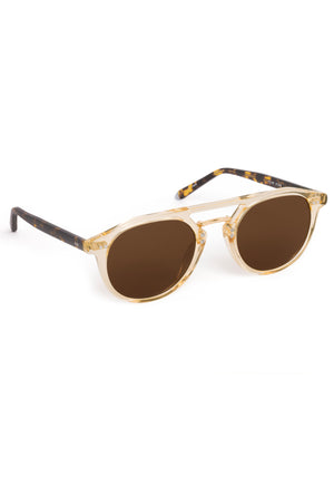 MARKLE | Champagne + Rue Tortoise 18K Polarized Handcrafted, luxury translucent tan acetate medium round KREWE Greyson polarized sunglasses with gold stainless steel metal hardware 