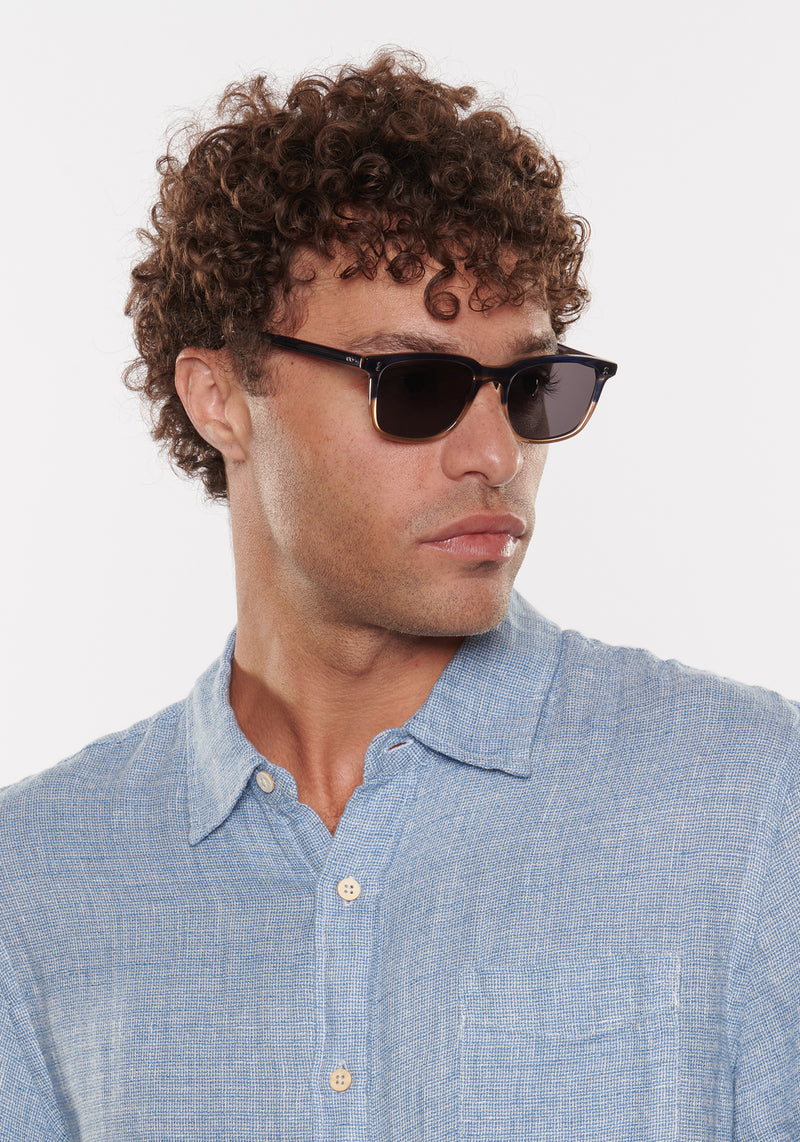 MATTHEW | Comet + Twilight Handcrafted, luxury navy and light brown acetate KREWE sunglasses mens model | Model: Miguel