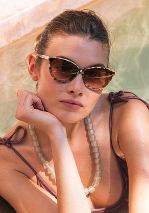 MONROE NYLON | Capri Handcrafted, luxury multicolored acetate cat-eye nylon KREWE sunglasses womens model campaign | Model: Kennidy