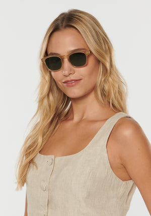 PARKER | Chamomile Handcrafted, luxury glossy tan acetate square wayfarer KREWE sunglasses womens model | Model: Erica