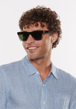 RORY | Nori Handcrafted, luxury brown green light blue gradient acetate large square rectangular KREWE sunglasses mens model | Model: Miguel