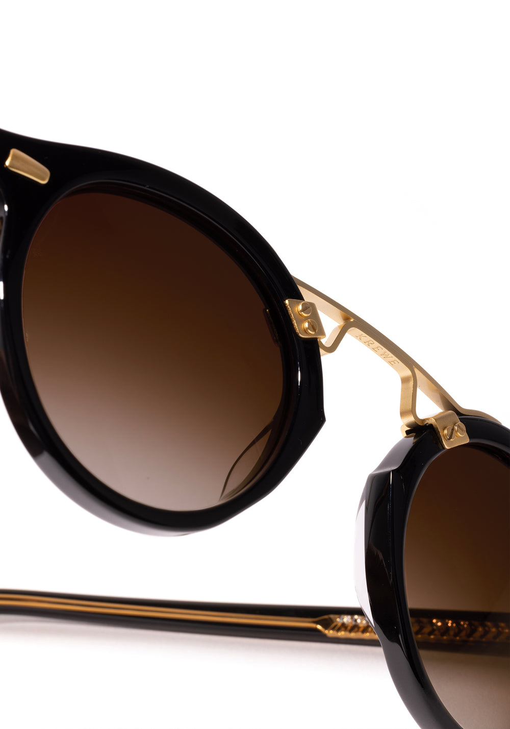 STL II | Black + Black Tea 18K Handcrafted, large round black acetate and 18K gold metal bridge KREWE sunglasses womens model