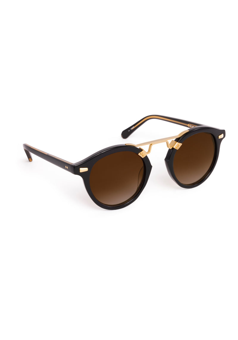 STL II | Black + Black Tea 18K Handcrafted, large round black acetate and 18K gold metal bridge KREWE sunglasses 