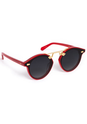 STL NYLON | Cherry 18K Handcrafted, luxury red cherry acetate round KREWE sunglasses with flat edge to edge nylon lens and 18k gold metal bridge