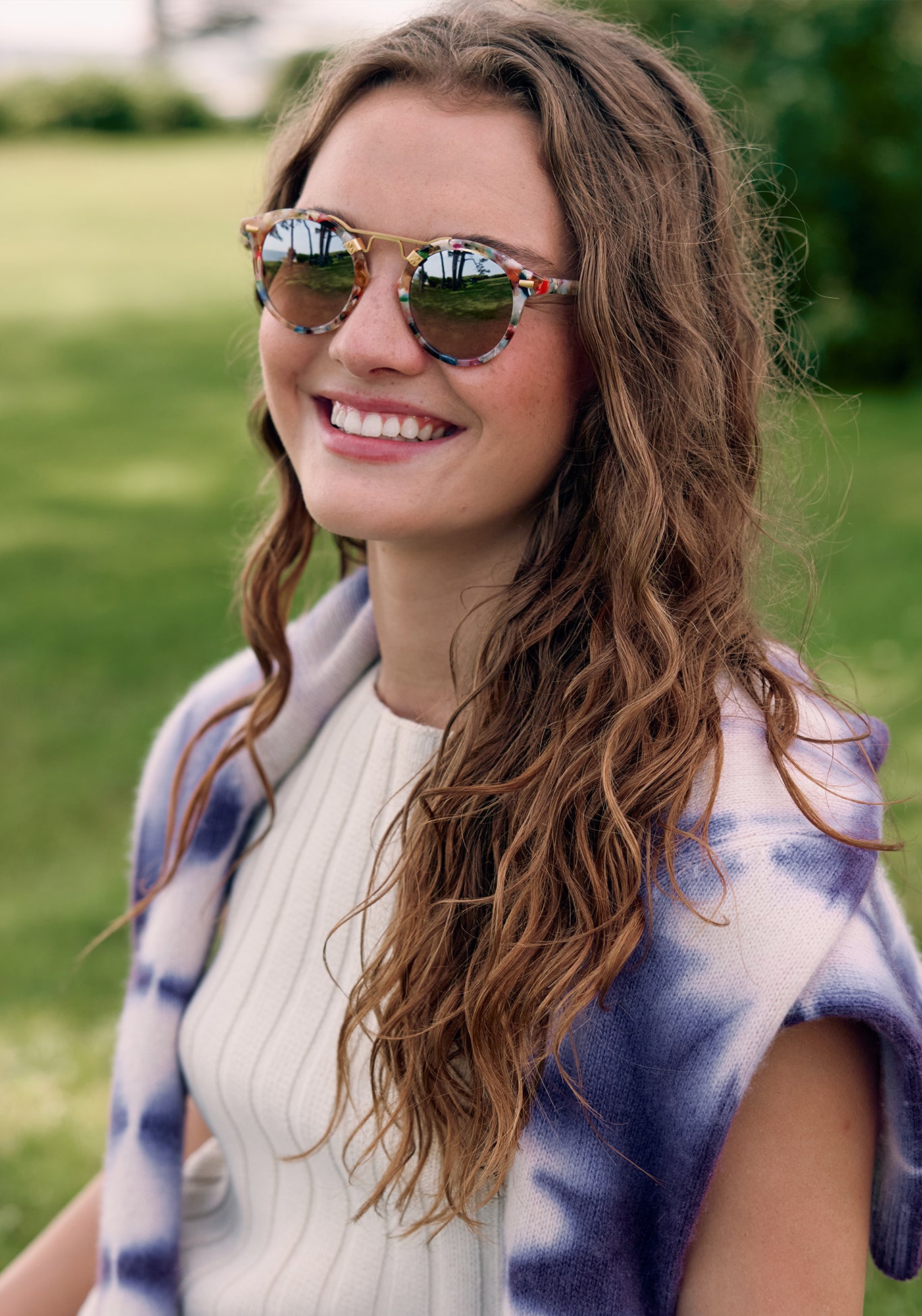 ST. LOUIS | Gelato 24K Mirrored Handcrafted, luxury, multicolored acetate mirrored round KREWE sunglasses with gold bridge and hardware womens model campaign | Model: Morgan J