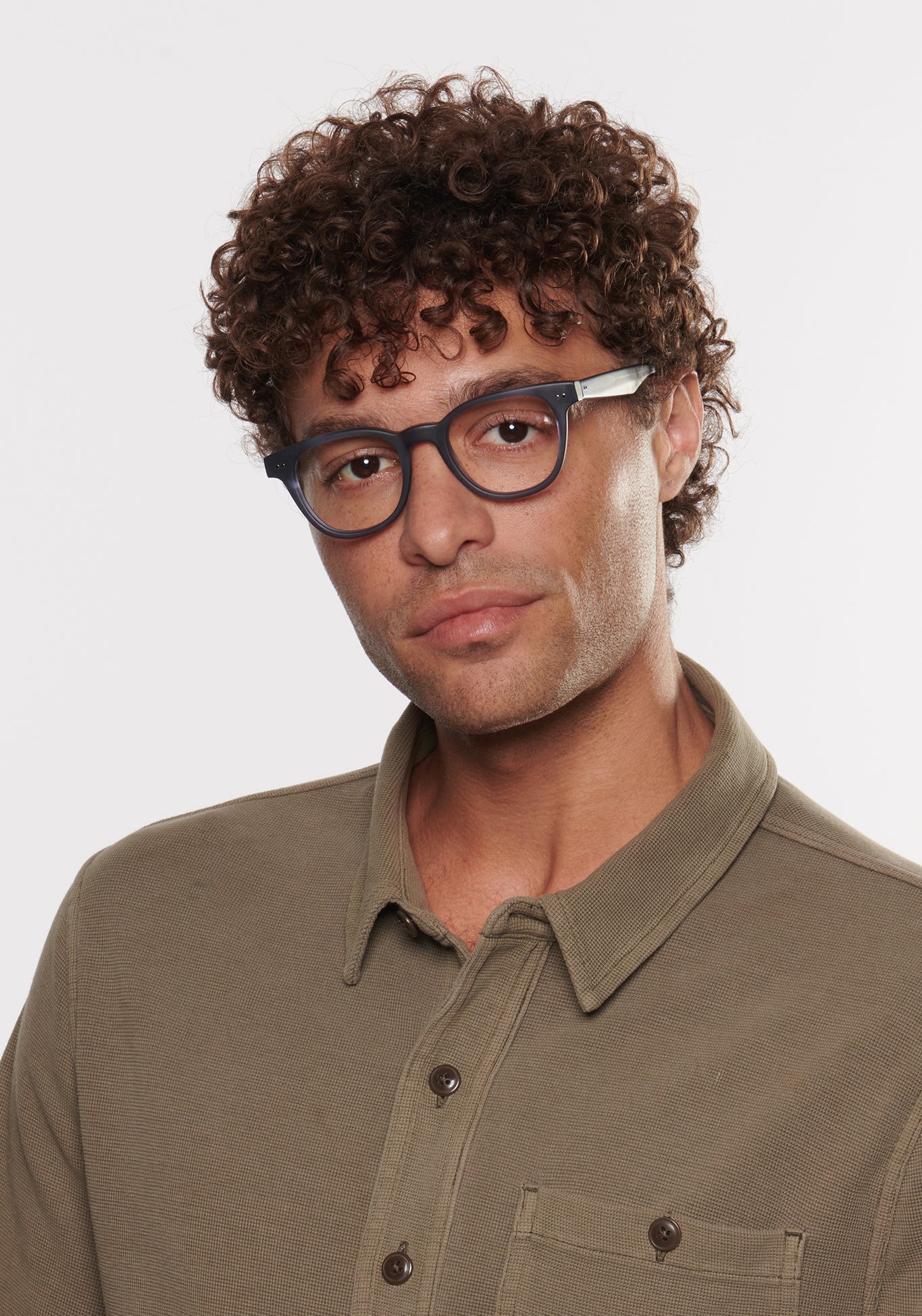 TUCKER | Matte Denim Handcrafted, luxury matte dark blue navy square wayfarer KREWE eyeglasses mens model | Model: Miguel