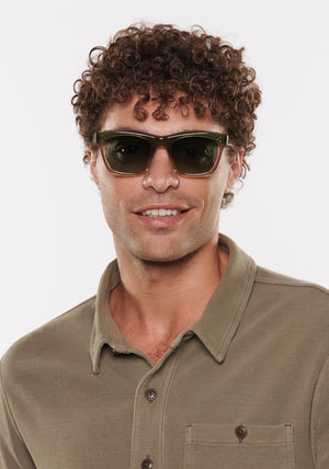 MATTHEW | Comet + Twilight Handcrafted, luxury navy and light brown acetate KREWE sunglasses mens model | Model: Miguel